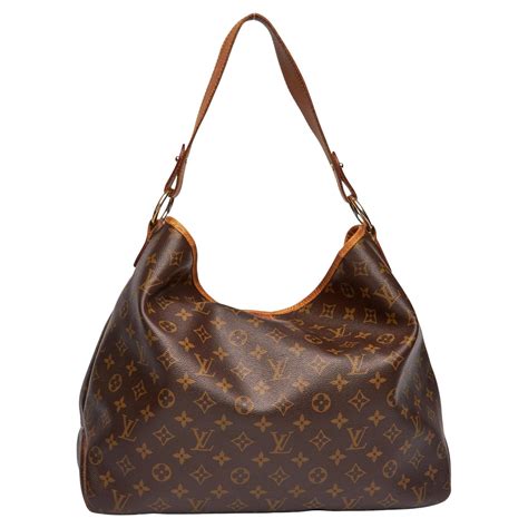 louis vuitton black monogram mahina leather xs bag|More.